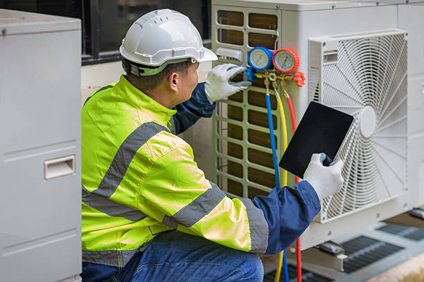 Professional Air Conditioning Repair technician working in Delafield, WI